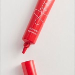 Arrive Here Skin Boost Perfecting Tint in Tan